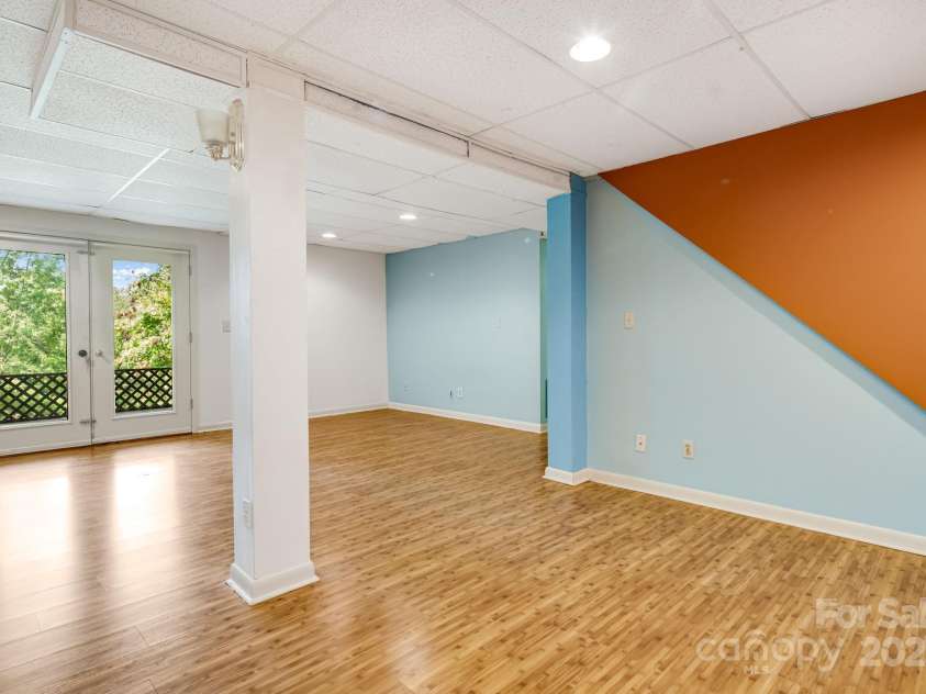 1360 Jupiter Road, Weaverville, NC 28787.  MLS# CAR4276296, YatesRealty ID 26556. Basement Apartment Open Kitchen and Living Space