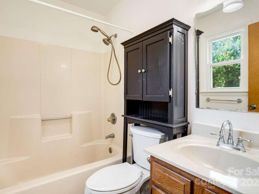 1360 Jupiter Road, Weaverville, NC 28787.  MLS# CAR4276296, YatesRealty ID 26556. Primary Bathroom Main Floor