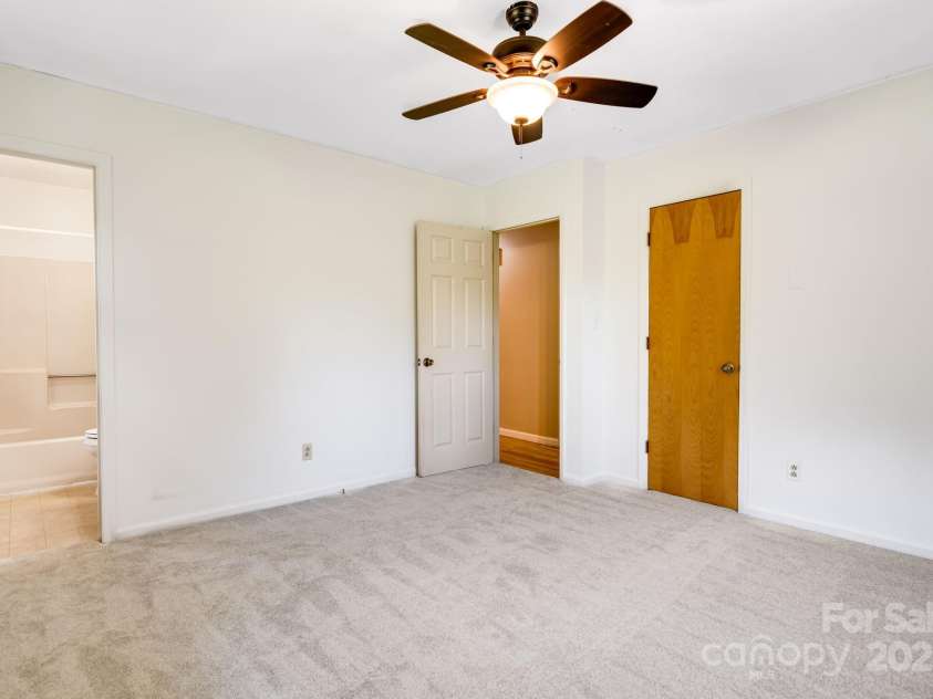 1360 Jupiter Road, Weaverville, NC 28787.  MLS# CAR4276296, YatesRealty ID 26556. Primary Bedroom Main Floor