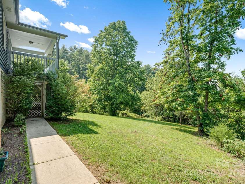 1360 Jupiter Road, Weaverville, NC 28787.  MLS# CAR4276296, YatesRealty ID 26556. Private entrance to Basement Apartment