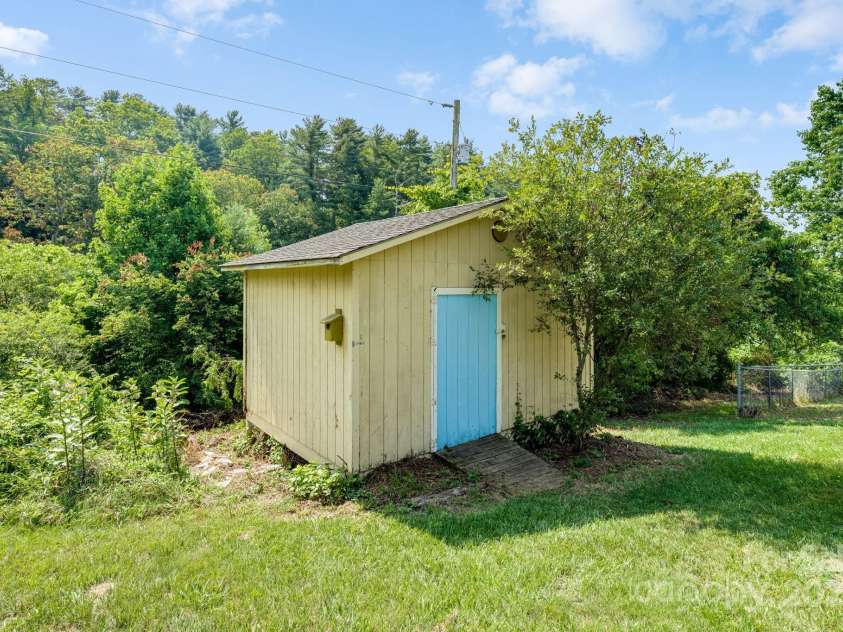 1360 Jupiter Road, Weaverville, NC 28787.  MLS# CAR4276296, YatesRealty ID 26556. Shed