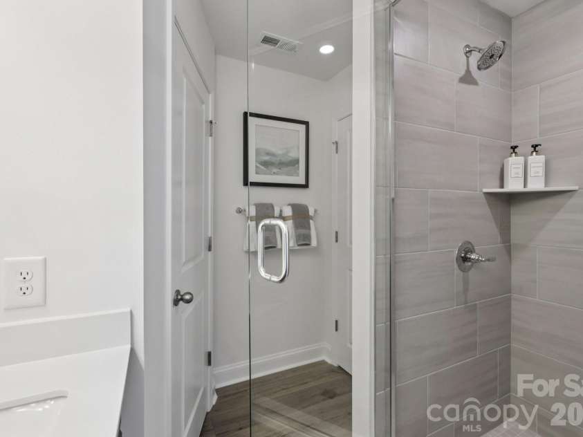 7621 Ethora Way, Charlotte, NC 28216.  MLS# CAR4373626, YatesRealty ID 26557. Owner's Bath Shower