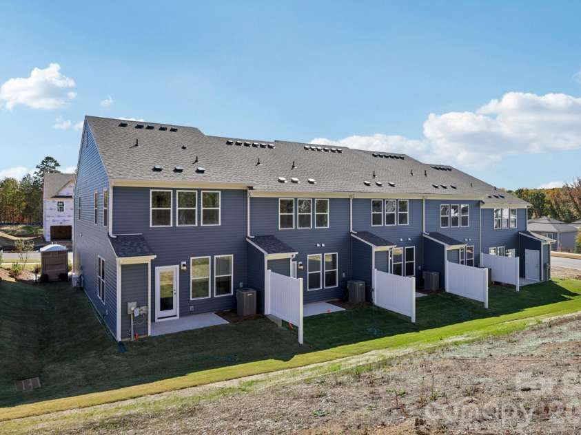 7621 Ethora Way, Charlotte, NC 28216.  MLS# CAR4373626, YatesRealty ID 26557. Rear Exterior