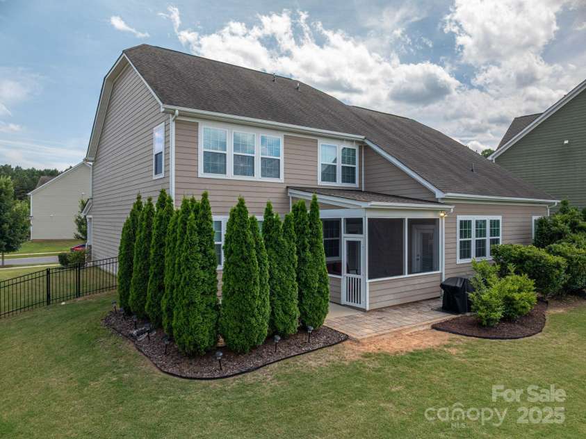 104 Wingstem Court, Mooresville, NC 28117.  MLS# CAR4269574, YatesRealty ID 26559. Backyard & Screened-in back porch