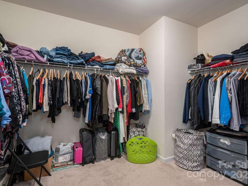 104 Wingstem Court, Mooresville, NC 28117.  MLS# CAR4269574, YatesRealty ID 26559. Primary Suite Walk-in Closet
