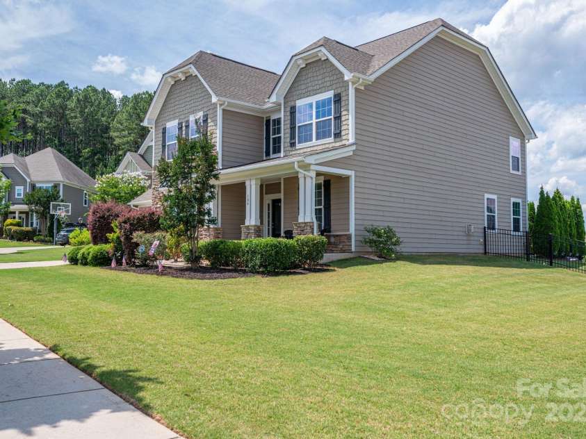 104 Wingstem Court, Mooresville, NC 28117.  MLS# CAR4269574, YatesRealty ID 26559. Side Yard