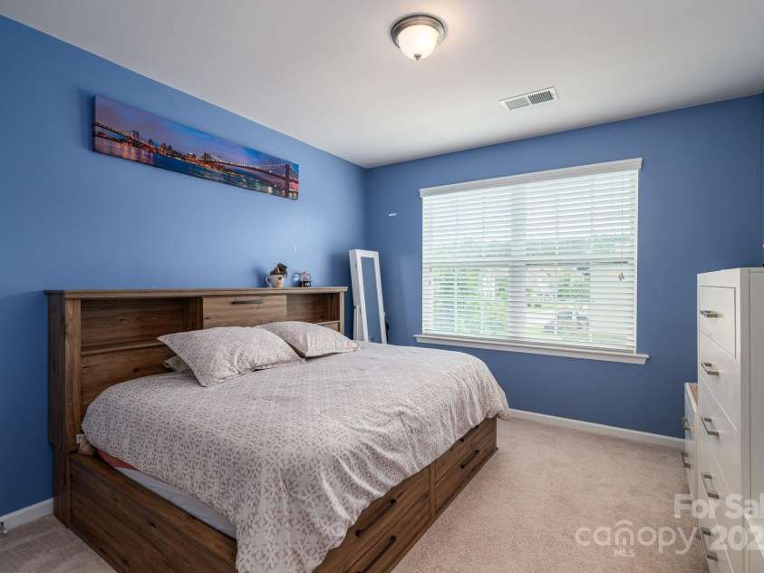 104 Wingstem Court, Mooresville, NC 28117.  MLS# CAR4269574, YatesRealty ID 26559. Upstairs Bedroom