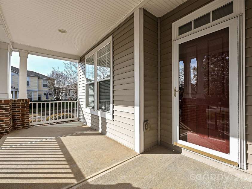 14944 Carbert Lane, Huntersville, NC 28078.  MLS# CAR4198819, YatesRealty ID 2656. Rocking Chair Front Porch