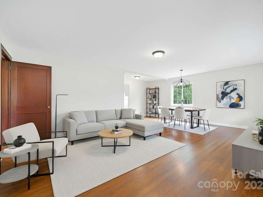 255 North Country Club Road, Brevard, NC 28712.  MLS# CAR4290219, YatesRealty ID 2656. Virtually staged great room