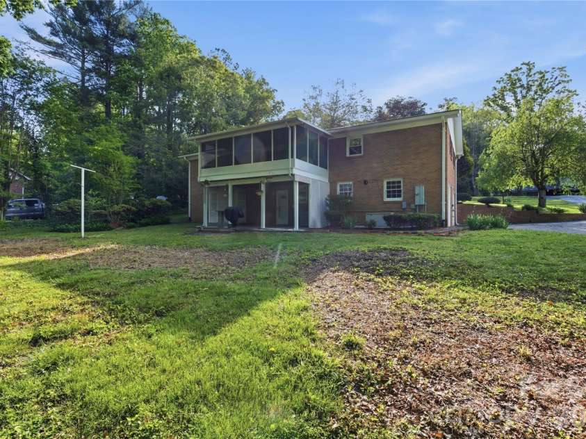 123 Castleton Lane, Hendersonville, NC 28791.  MLS# CAR4375976, YatesRealty ID 26560. Large Level Backyard