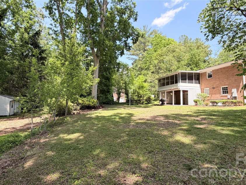 123 Castleton Lane, Hendersonville, NC 28791.  MLS# CAR4375976, YatesRealty ID 26560. Large, mostly level backyard