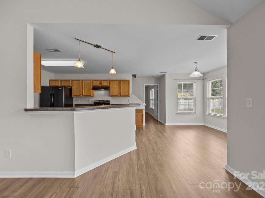 423 Courtland Court, Kannapolis, NC 28081.  MLS# CAR4261272, YatesRealty ID 26561. Kitchen to Dini/Users/pamelalambert/Downloads/4936 Bentridge Dr/4936 Bentridge Dr-1.jpgng Room