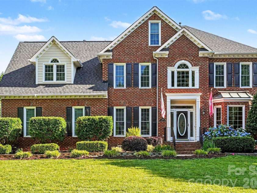 7068 Kidwelly Lane, Matthews, NC 28104.  MLS# CAR4379419, YatesRealty ID 26562. 