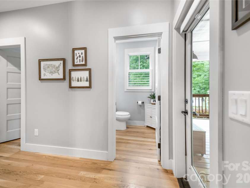 9 Ashe Park Circle, Asheville, NC 28806.  MLS# CAR4377416, YatesRealty ID 26564. Covered porch access, half bath, and larger pantry storage.