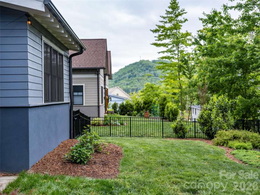 9 Ashe Park Circle, Asheville, NC 28806.  MLS# CAR4377416, YatesRealty ID 26564. Fully fenced back yard - with mountain views.