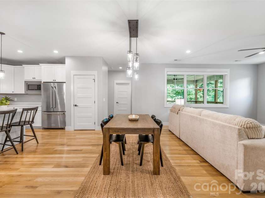 9 Ashe Park Circle, Asheville, NC 28806.  MLS# CAR4377416, YatesRealty ID 26564. Open great room for kitchen, dining, and living.
