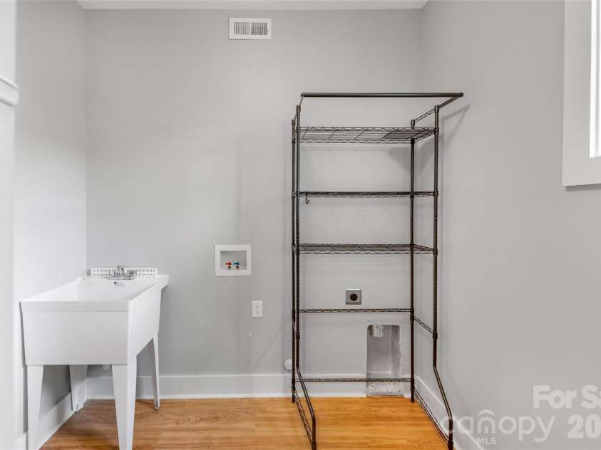 9 Ashe Park Circle, Asheville, NC 28806.  MLS# CAR4377416, YatesRealty ID 26564. The laundry room.