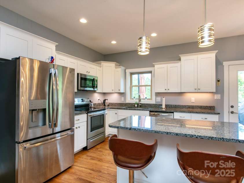 5 Pine Drive, Weaverville, NC 28787.  MLS# CAR4257819, YatesRealty ID 26567. Granite countertops