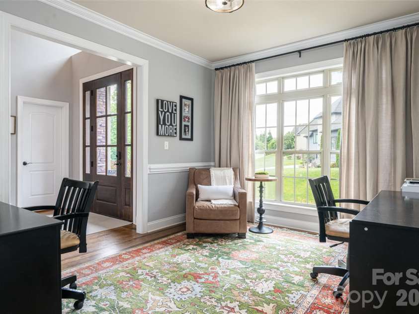 75 Ledgestone Drive, Fairview, NC 28730.  MLS# CAR4371731, YatesRealty ID 26567. Dining room on main level just steps from the kitchen-- current homeowners use this room as a home office