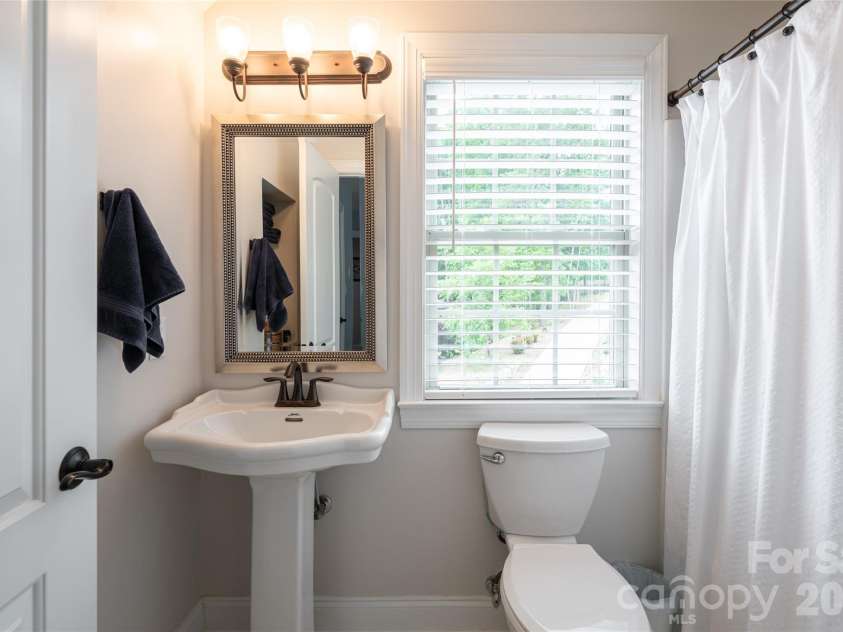 75 Ledgestone Drive, Fairview, NC 28730.  MLS# CAR4371731, YatesRealty ID 26567. Ensuite bathroom in bedroom  #3 