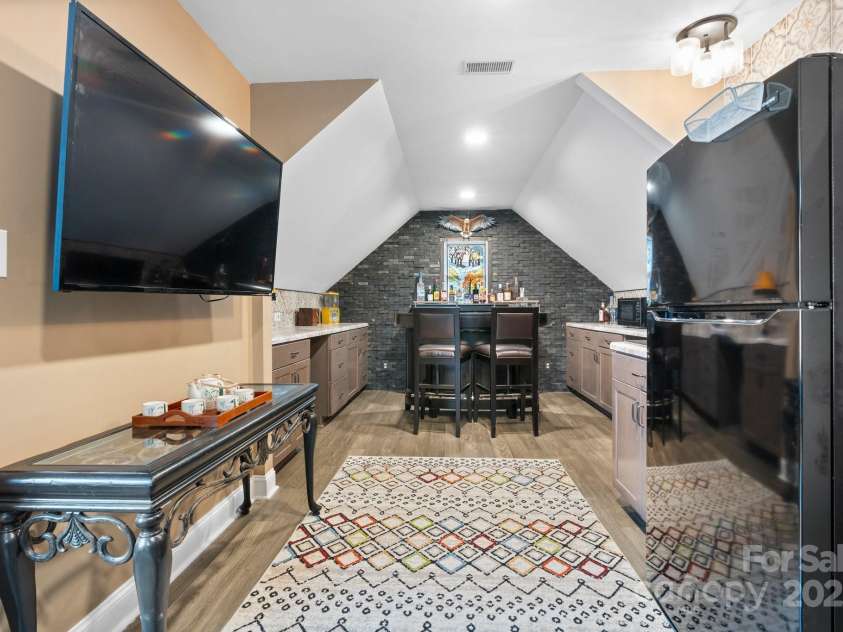 4007 Lake Shore Road, Denver, NC 28037.  MLS# CAR4271111, YatesRealty ID 26569. Great hangout/entertaining spot when it's raining or just too hot!