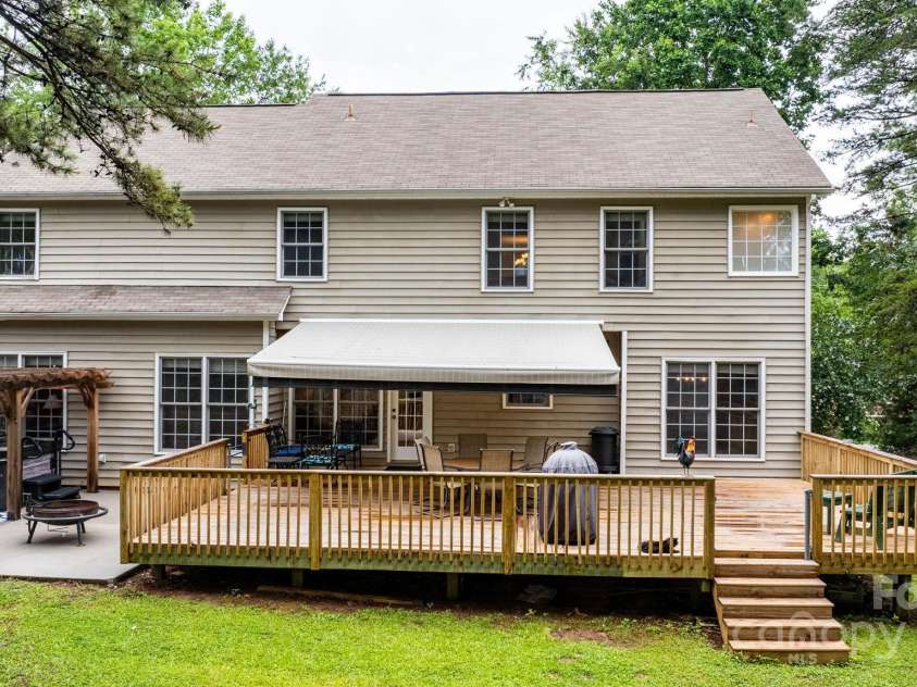 4007 Lake Shore Road, Denver, NC 28037.  MLS# CAR4271111, YatesRealty ID 26569. Outside is this expansive back deck and patio area - accessed from the kitchen.
