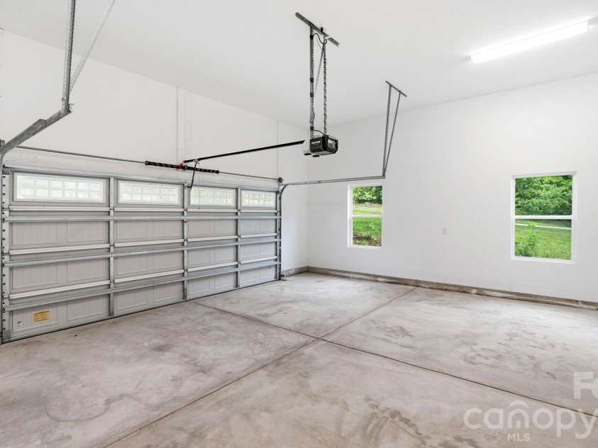 825 Breezewood Drive, Charlotte, NC 28262.  MLS# CAR4384219, YatesRealty ID 26571. 2 Car garage