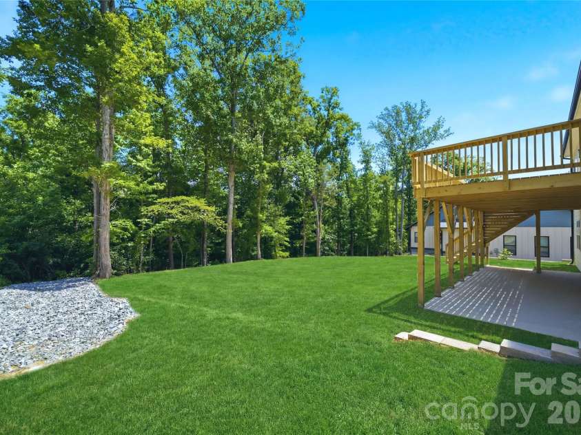 825 Breezewood Drive, Charlotte, NC 28262.  MLS# CAR4384219, YatesRealty ID 26571. Backyard