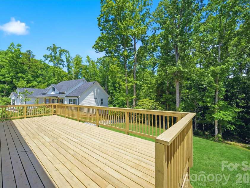 825 Breezewood Drive, Charlotte, NC 28262.  MLS# CAR4384219, YatesRealty ID 26571. Deck area