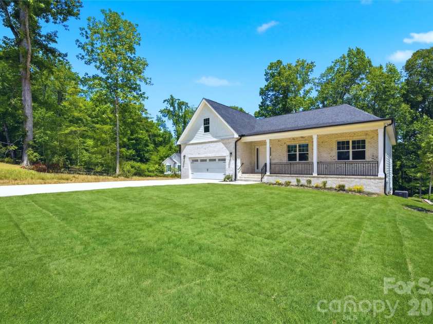 825 Breezewood Drive, Charlotte, NC 28262.  MLS# CAR4384219, YatesRealty ID 26571. Side view