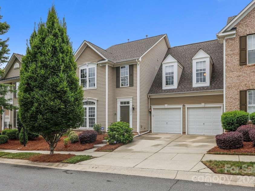 10217 Linksland Drive, Huntersville, NC 28078.  MLS# CAR4281355, YatesRealty ID 26573. 2-car garage features epoxy flooring, ample parking, room for storage