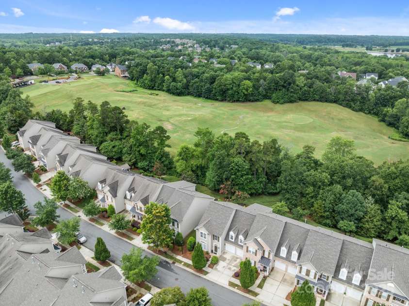 10217 Linksland Drive, Huntersville, NC 28078.  MLS# CAR4281355, YatesRealty ID 26573. Aerial view of Linksland Drive backing up to the Skybrook golf course.
