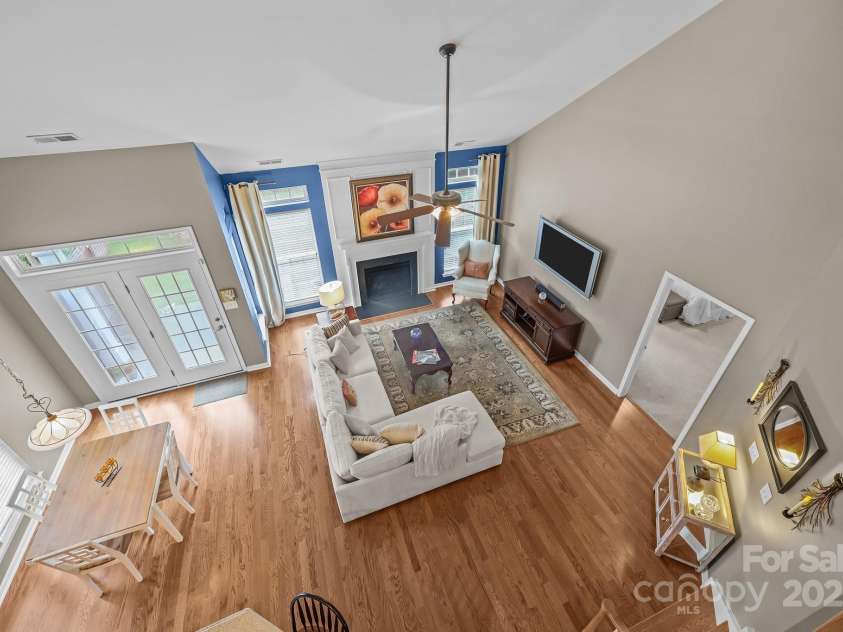 10217 Linksland Drive, Huntersville, NC 28078.  MLS# CAR4281355, YatesRealty ID 26573. View of great room and breakfast area from second floor loft.