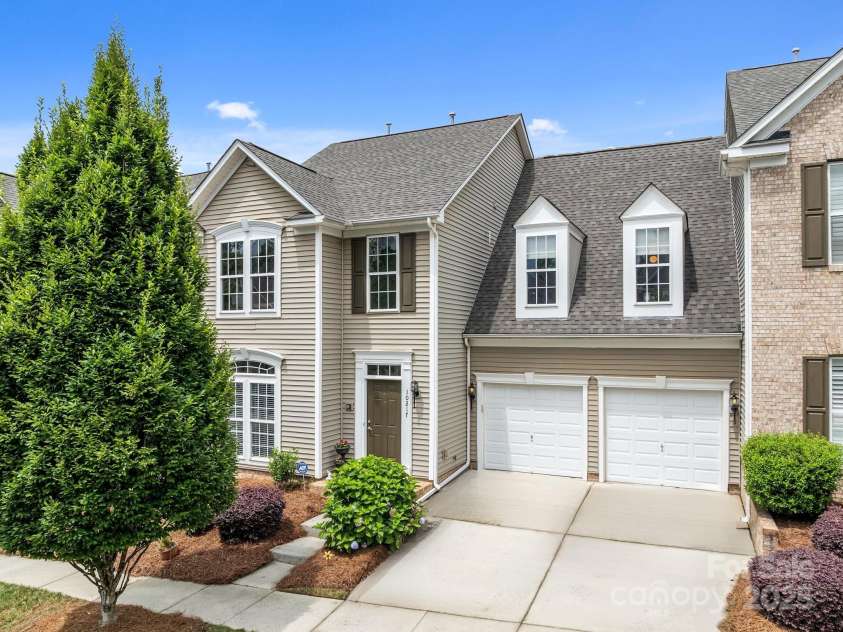10217 Linksland Drive, Huntersville, NC 28078.  MLS# CAR4281355, YatesRealty ID 26573. Welcome to 10217 Linksland Drive in Huntersville, NC. This 3,135 square foot townhome features two primary bedroom suites and feels and lives like a single family home.
