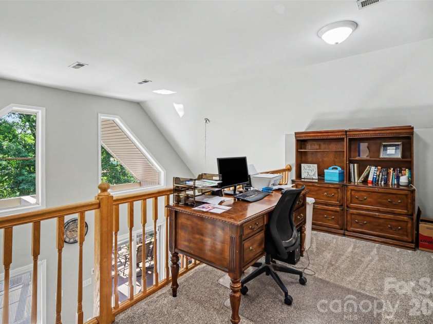 393 Stillwater Road, Troutman, NC 28166.  MLS# CAR4384450, YatesRealty ID 26574. Loft / office area on upper level