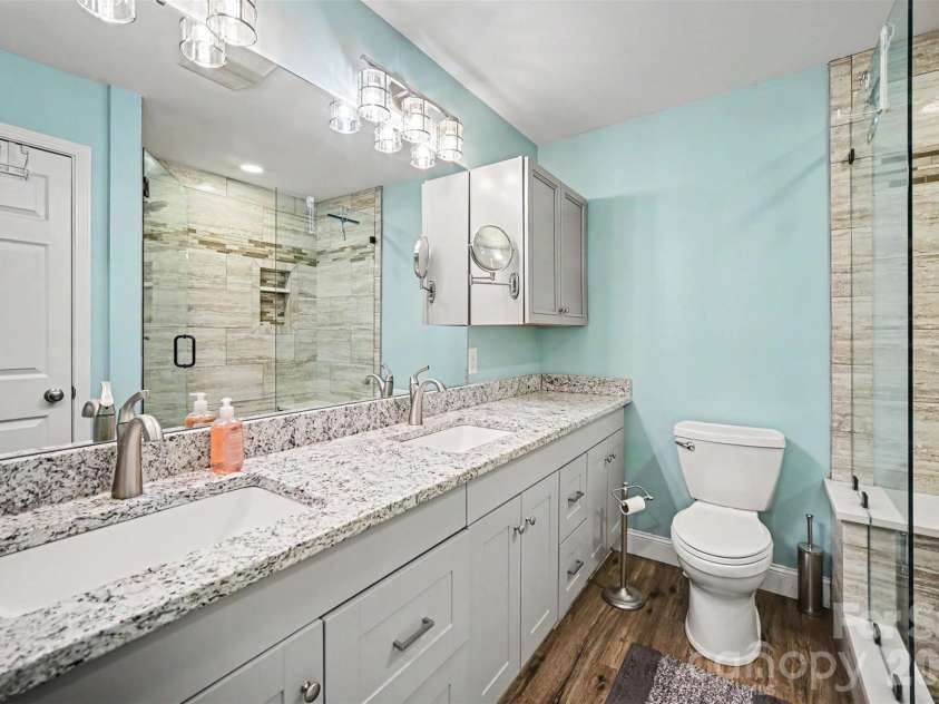 393 Stillwater Road, Troutman, NC 28166.  MLS# CAR4384450, YatesRealty ID 26574. Primary bath