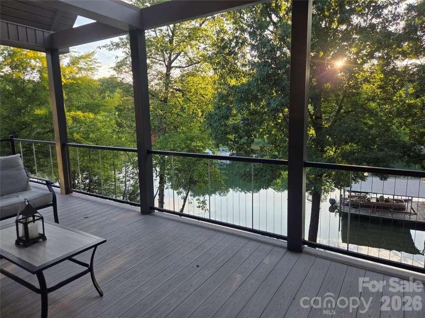 393 Stillwater Road, Troutman, NC 28166.  MLS# CAR4384450, YatesRealty ID 26574. View from porch