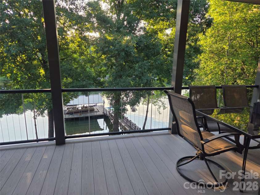 393 Stillwater Road, Troutman, NC 28166.  MLS# CAR4384450, YatesRealty ID 26574. View from porch