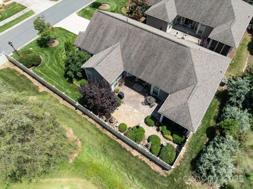 1313 Haywood Park Drive, Waxhaw, NC 28173.  MLS# CAR4279018, YatesRealty ID 26575. Aerial View Showcasing Privacy, Mature Landscaping, Greenspace & Privacy Fence Around This Lovely Home