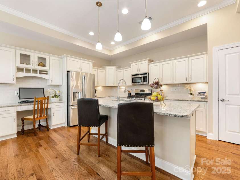 1313 Haywood Park Drive, Waxhaw, NC 28173.  MLS# CAR4279018, YatesRealty ID 26575. Custom Cabinets with Deep Drawers, Pull-Out Trash & Recycle Bins, and Ample Storage Space