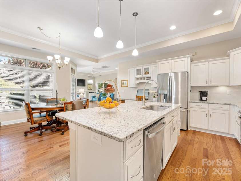 1313 Haywood Park Drive, Waxhaw, NC 28173.  MLS# CAR4279018, YatesRealty ID 26575. Enjoy Peaceful Nature Views from the Kitchen – Watch Hummingbirds by the Fountain as You Cook