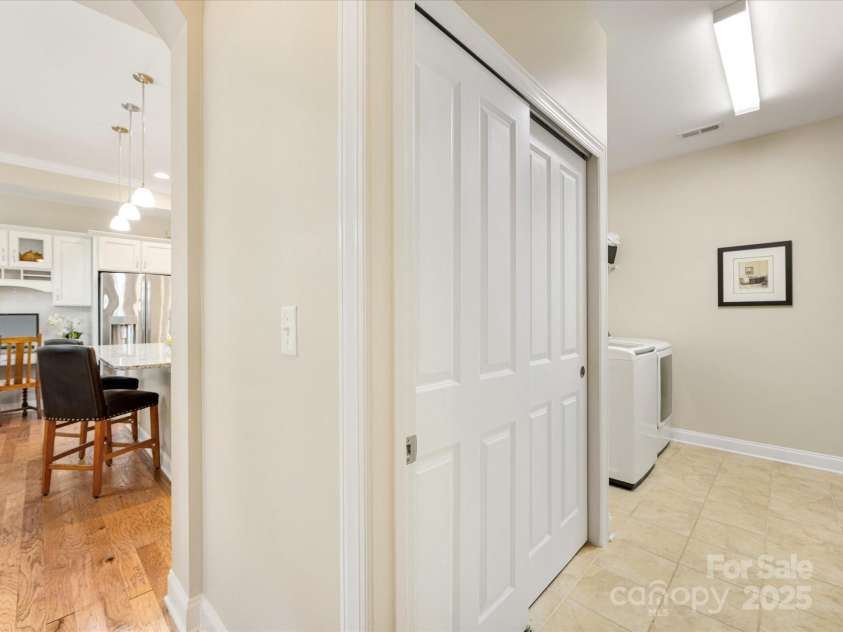 1313 Haywood Park Drive, Waxhaw, NC 28173.  MLS# CAR4279018, YatesRealty ID 26575. True Laundry Room with Utility Sink, Ample Storage, New Hot Water Heater & Tile Flooring