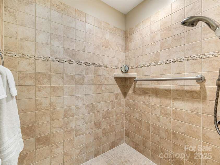 1313 Haywood Park Drive, Waxhaw, NC 28173.  MLS# CAR4279018, YatesRealty ID 26575. Zero-Edge Entryways at Garage, Patio Doors, and Extra-Large Roll-In Shower for Easy Accessibility