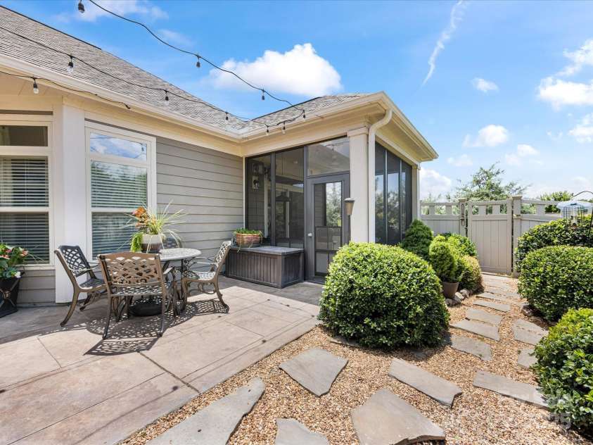 1313 Haywood Park Drive, Waxhaw, NC 28173.  MLS# CAR4279018, YatesRealty ID 26575. Zero grass to mow inside your courtyard.