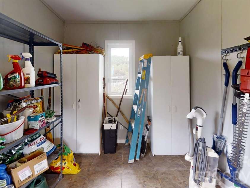 518 Forest Ridge Drive, Mars Hill, NC 28754.  MLS# CAR4384980, YatesRealty ID 26579. Garage storage room