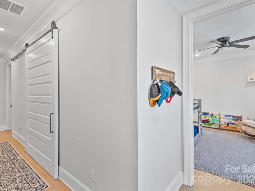 1111 Parkside Greenway Drive, Charlotte, NC 28209.  MLS# CAR4278048, YatesRealty ID 26583. Laundry Closet on Upper