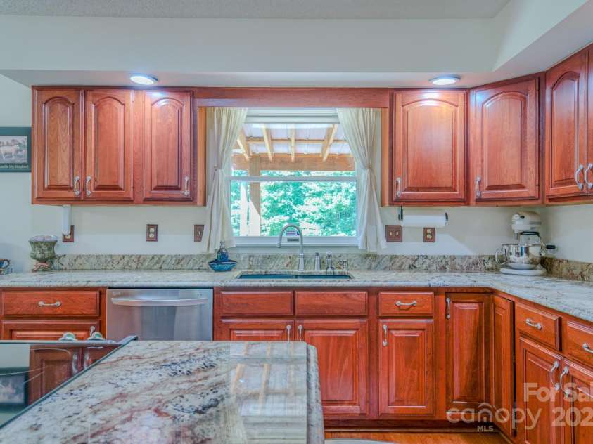 74 Challedon Drive, Candler, NC 28715.  MLS# CAR4276215, YatesRealty ID 26584. 