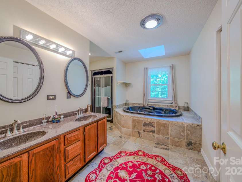 74 Challedon Drive, Candler, NC 28715.  MLS# CAR4276215, YatesRealty ID 26584. 