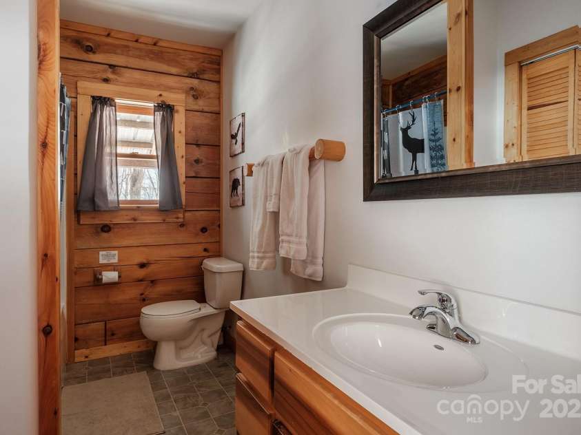 294 Paradise Valley Road, Zionville, NC 28698.  MLS# CAR4212519, YatesRealty ID 2659. Basement level bathroom