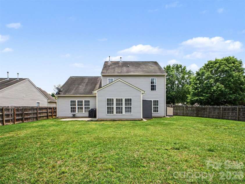 156 Barrington Drive, Mount Holly, NC 28120.  MLS# CAR4386064, YatesRealty ID 26591. Back Yard